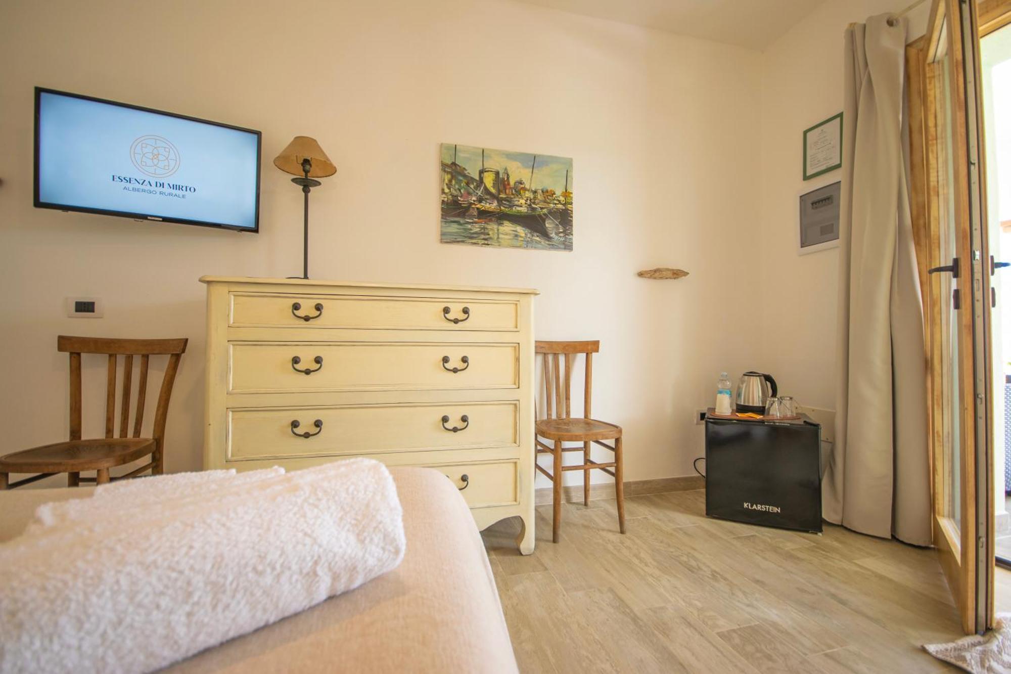 Hotel Essenza Di Mirto La Caletta Værelse billede