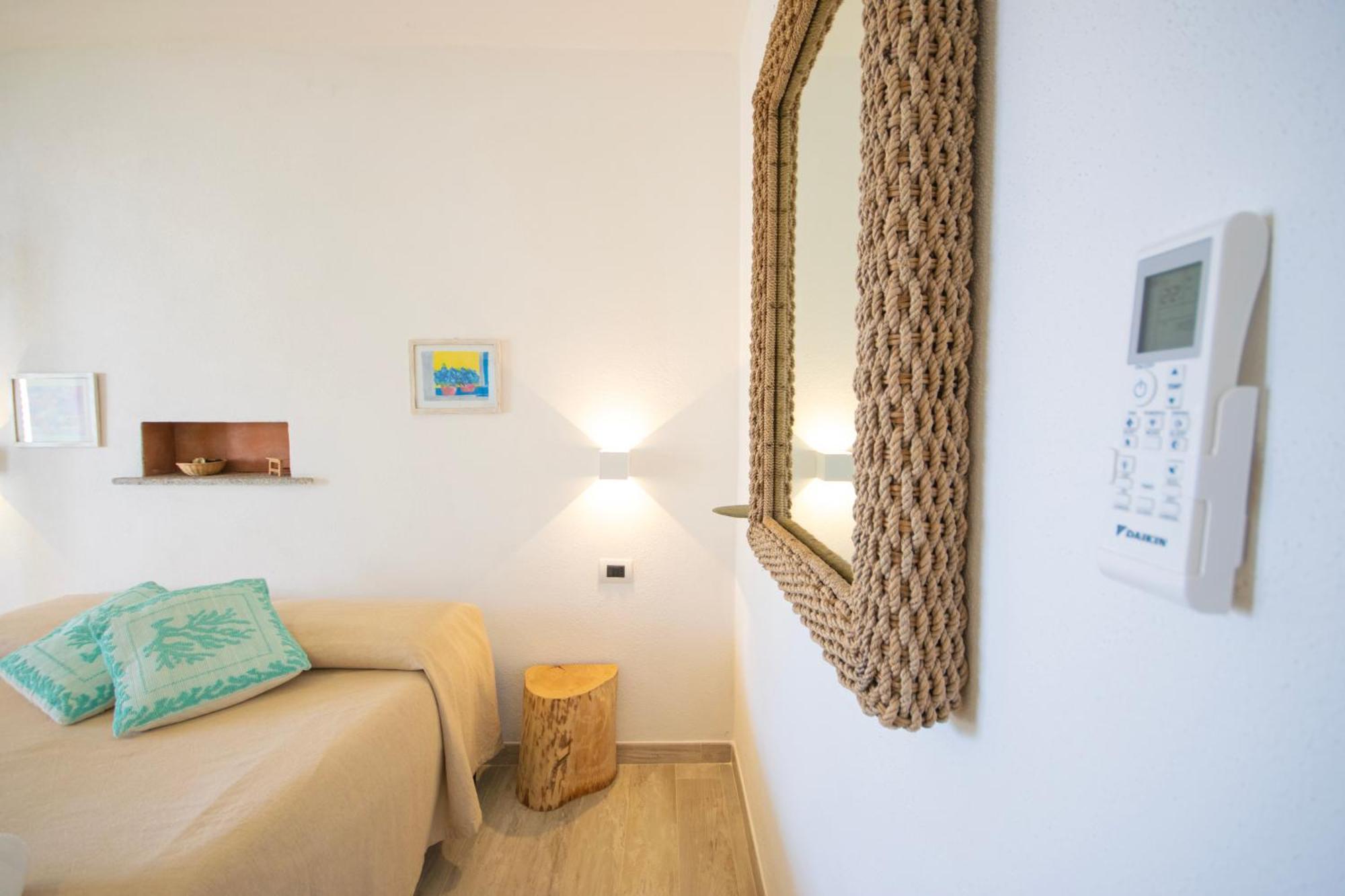 Hotel Essenza Di Mirto La Caletta Eksteriør billede