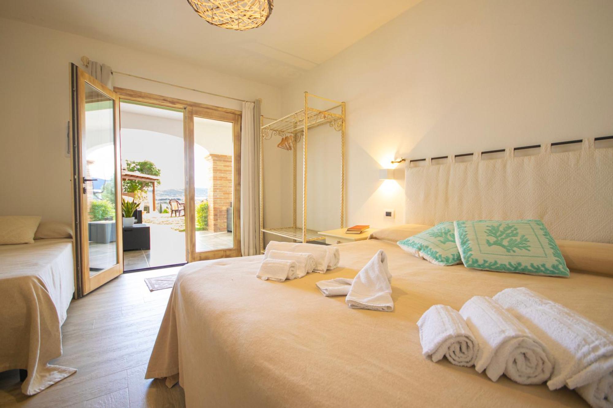 Hotel Essenza Di Mirto La Caletta Værelse billede