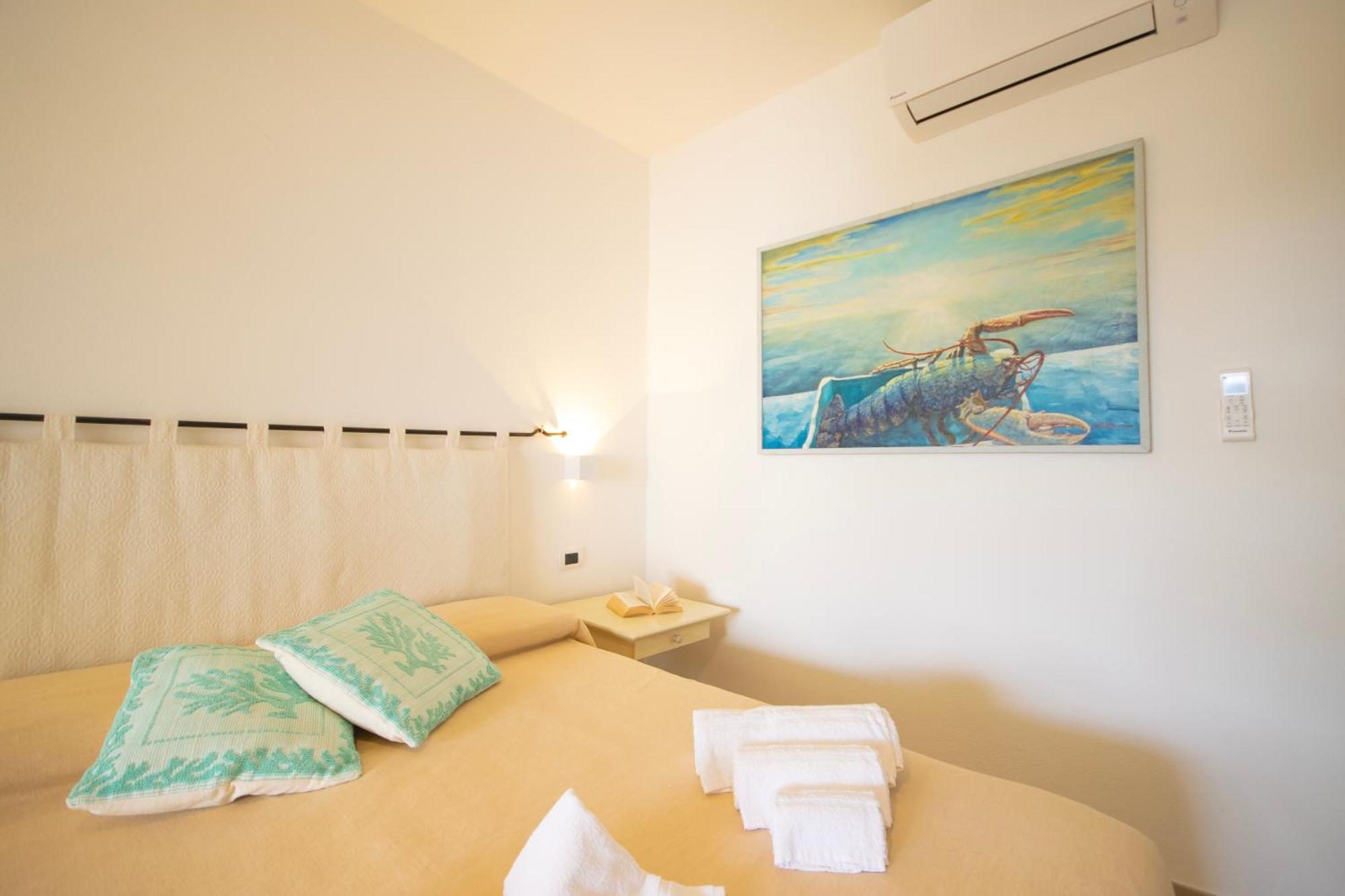 Hotel Essenza Di Mirto La Caletta Eksteriør billede