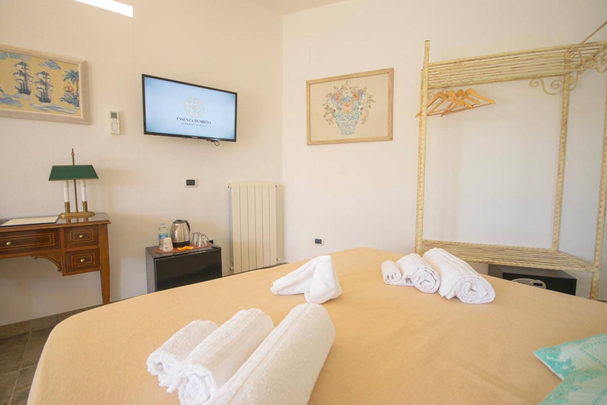 Hotel Essenza Di Mirto La Caletta Værelse billede