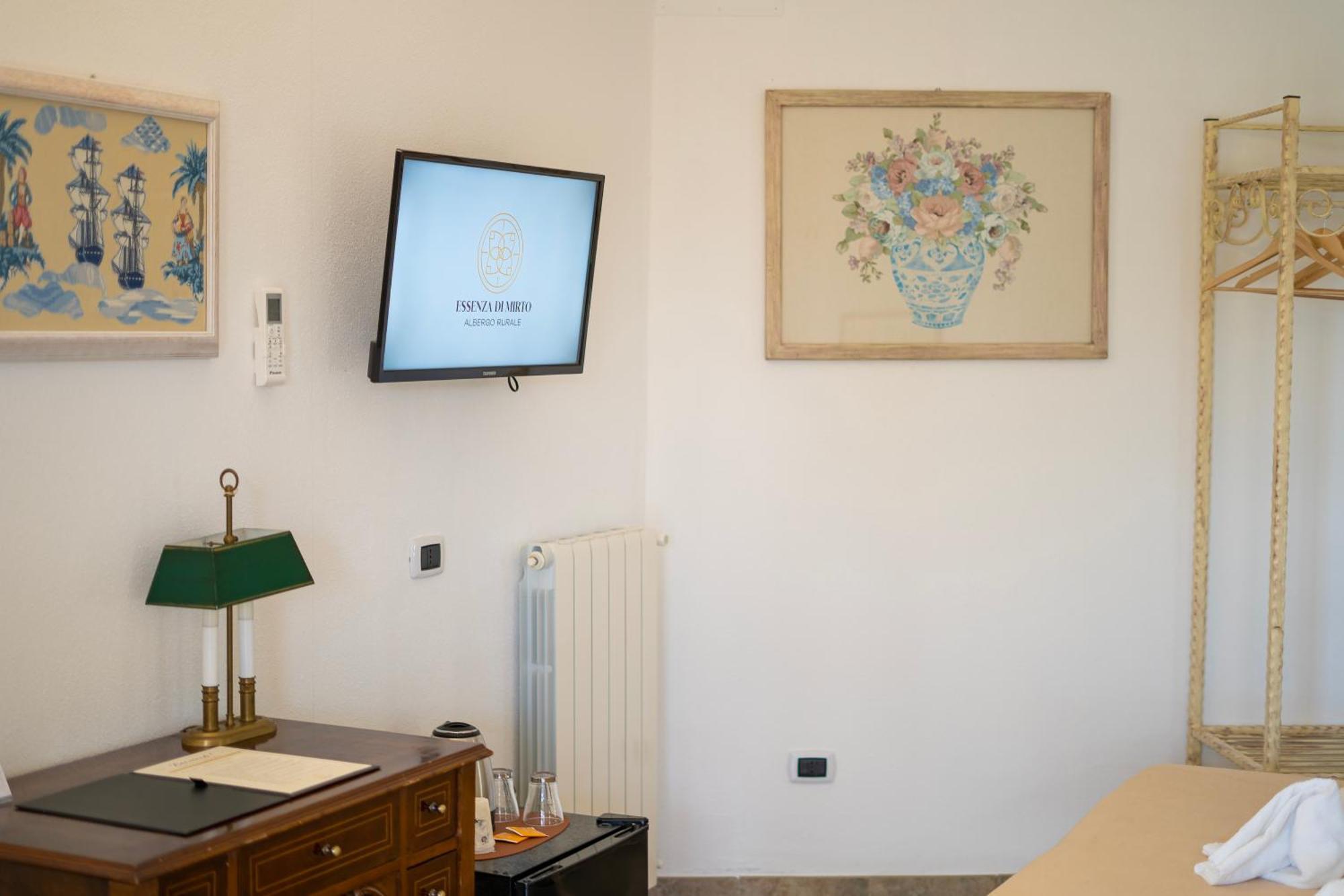 Hotel Essenza Di Mirto La Caletta Værelse billede